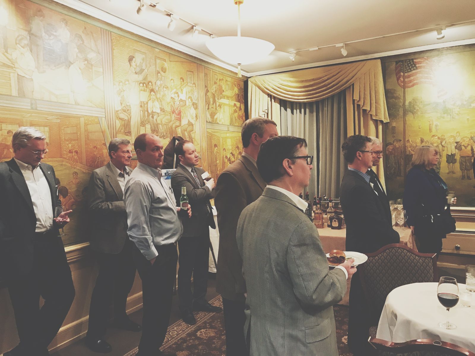 NIBA members networking at a reception
